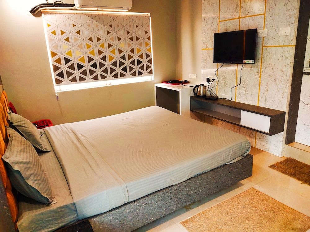 Nirmalya Grand Deluxe Room 7