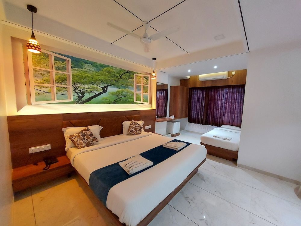 Grand Triple Room