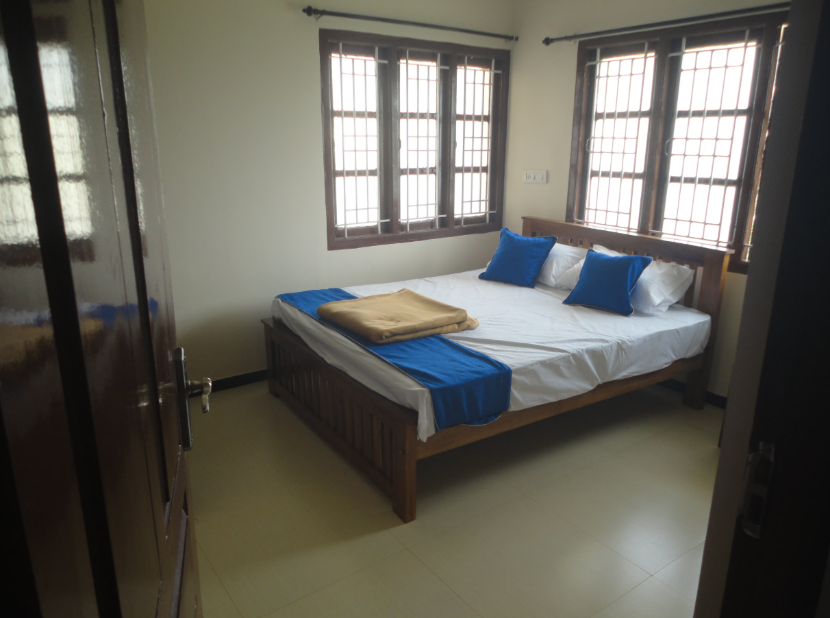 Sanvika Hotels and Service Apartments Deluxe Room