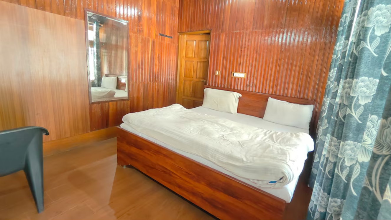 Mountain view wooden Cottages with common sitout area