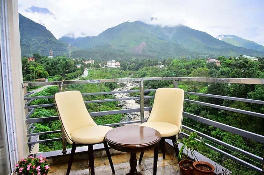 Super Deluxe with River Side View and Mountainside View with Balcony