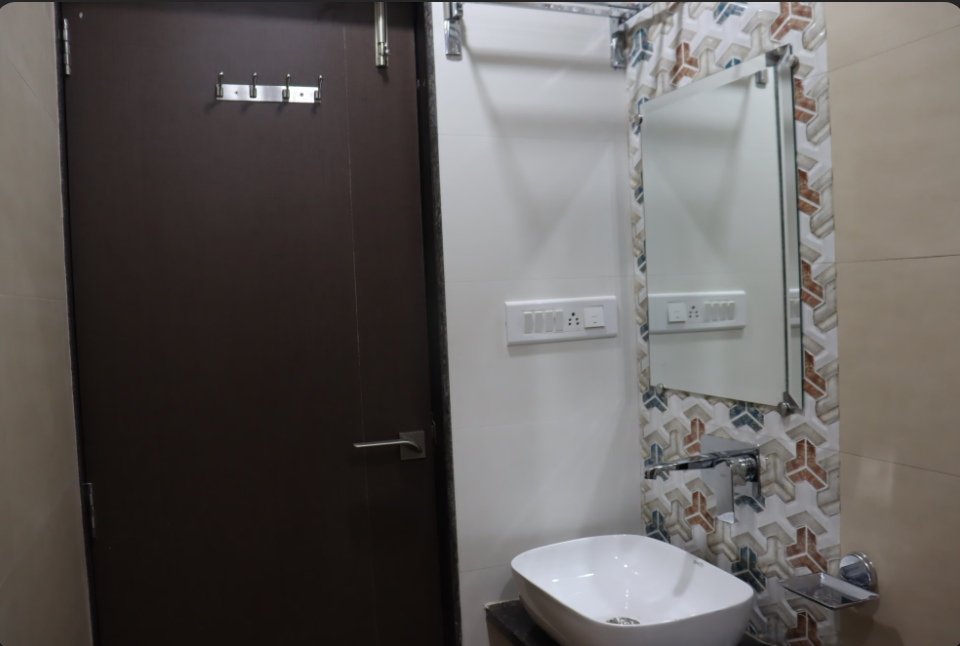 N K Excellency Deluxe Room 16