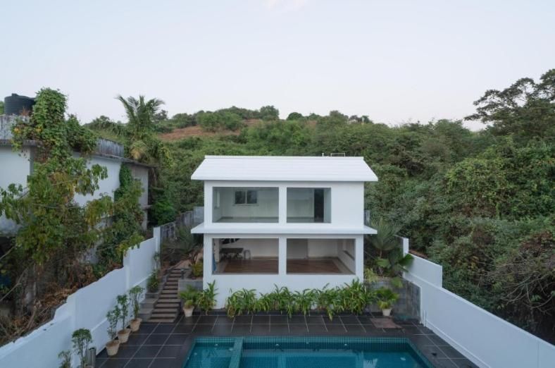 Alaya Stays Luxfort 2 BHK with Pool & Balconies