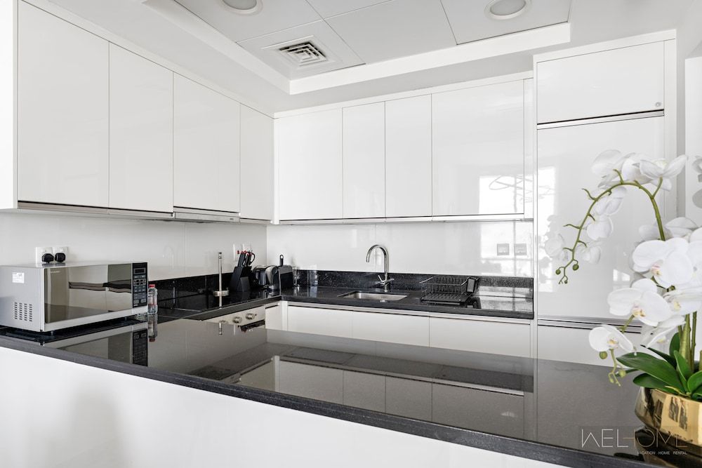 WelHome - Cozy 1BR Apt. in Al Habtoor City Partial Sea View