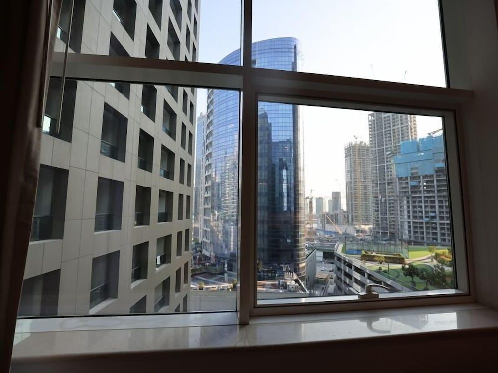 Cozy 1BR Buisness bay Damac Cour Jardin