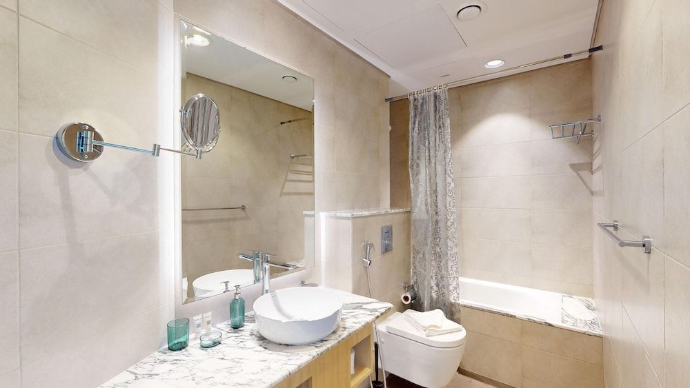 Primestay - 2BR Paramount Midtown-dubai