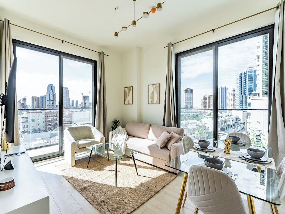 Apt with Artful Interior and Urban Views