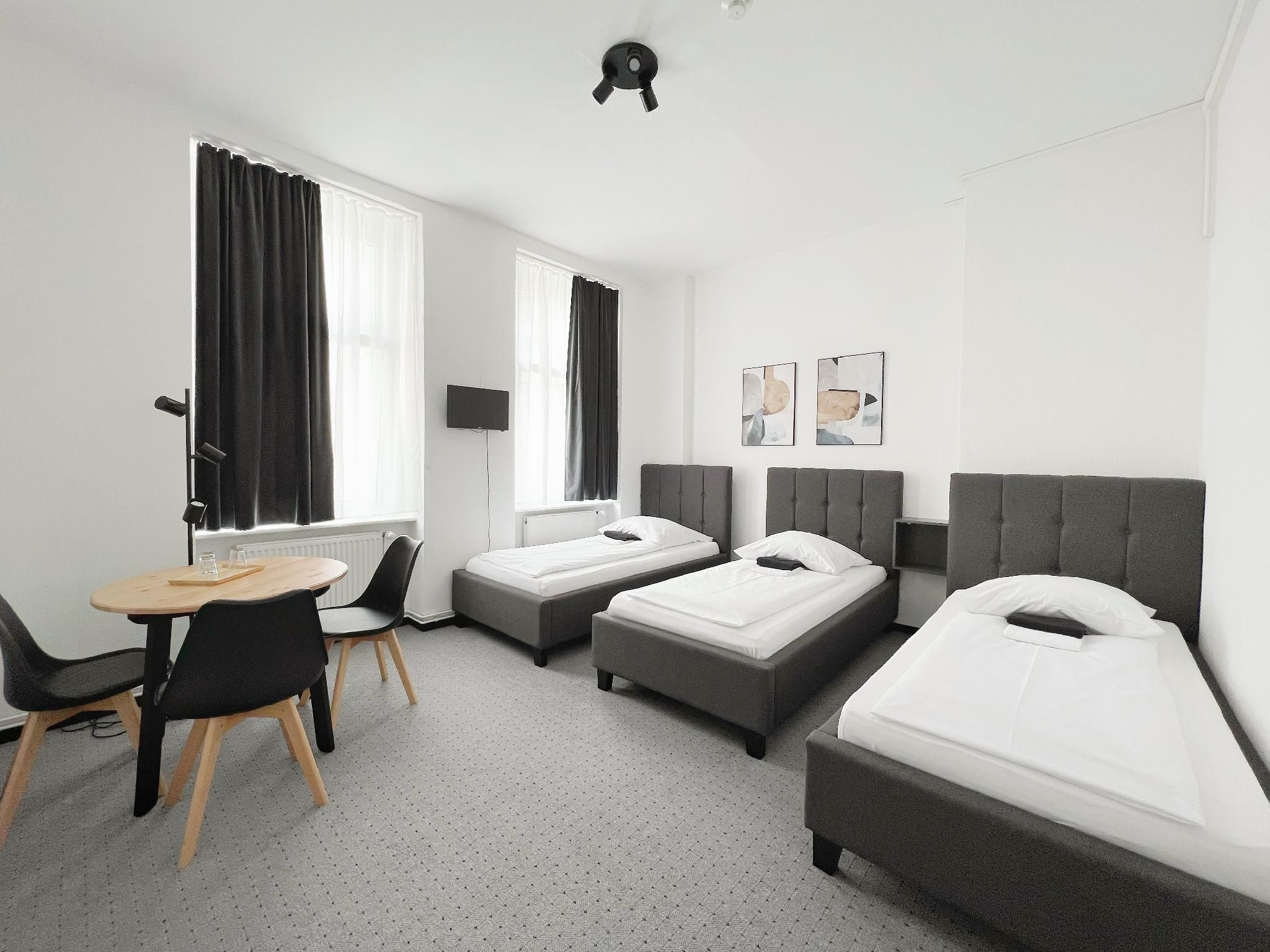 Classic Triple Room with Shared Bathroom