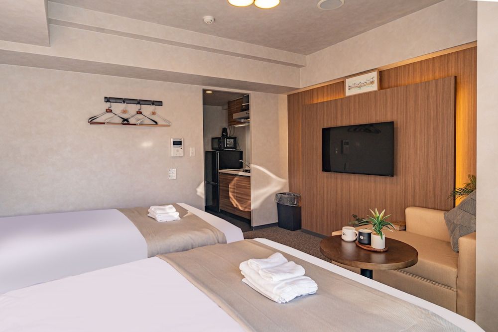 Quadruple Room, 2 Queen Beds, Non Smoking, Balcony