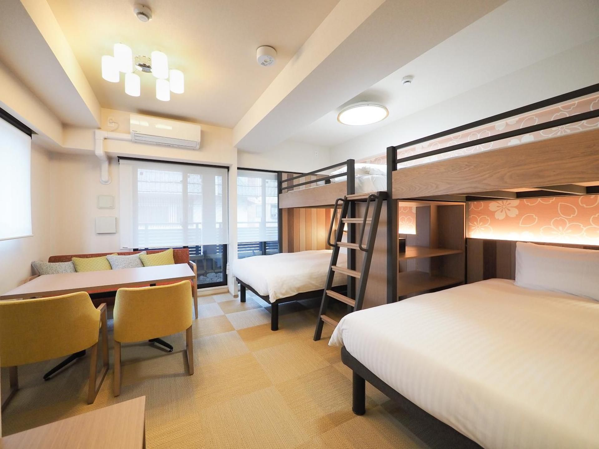 Family Room with Twin Beds and Loft Beds and Kitchen and Washing Machine