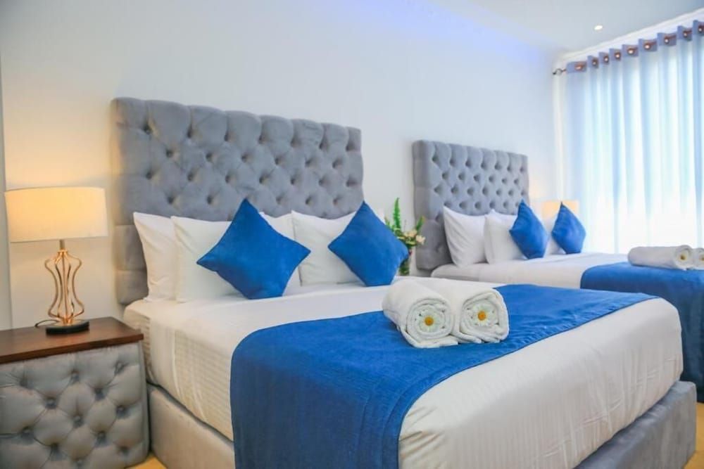 Family Quadruple Room, 2 Queen Beds, Balcony, Lake View