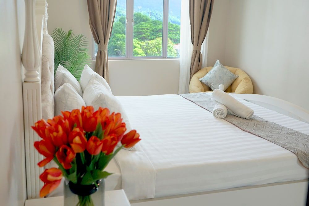 Triima Inn Dayang Bay by Perfect Host Quadruple Room 2
