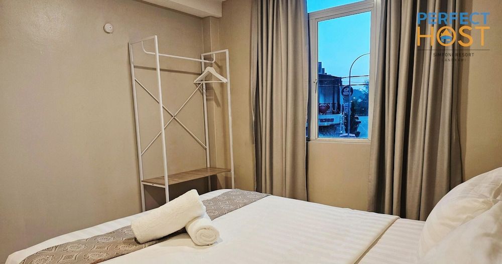 Triima Inn Dayang Bay by Perfect Host Quadruple Room 22