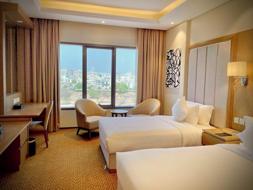 Mercure Muscat Deluxe Room, 2 Twin Beds, City View 3