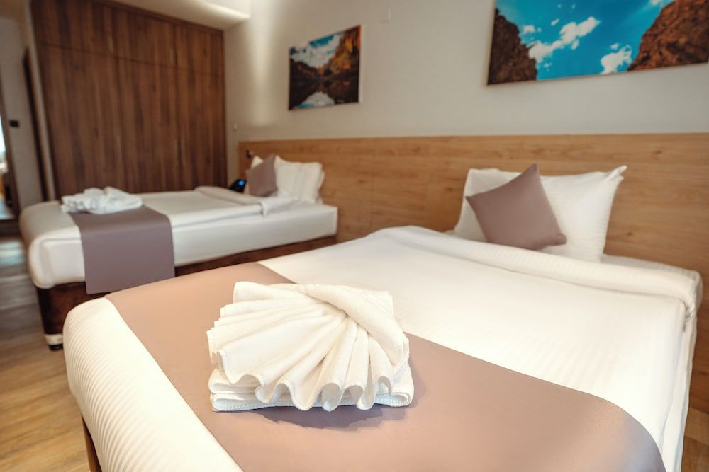 Kyriad Muscat Standard Room, Multiple Beds 3