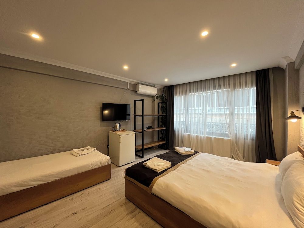 Deluxe Triple Room