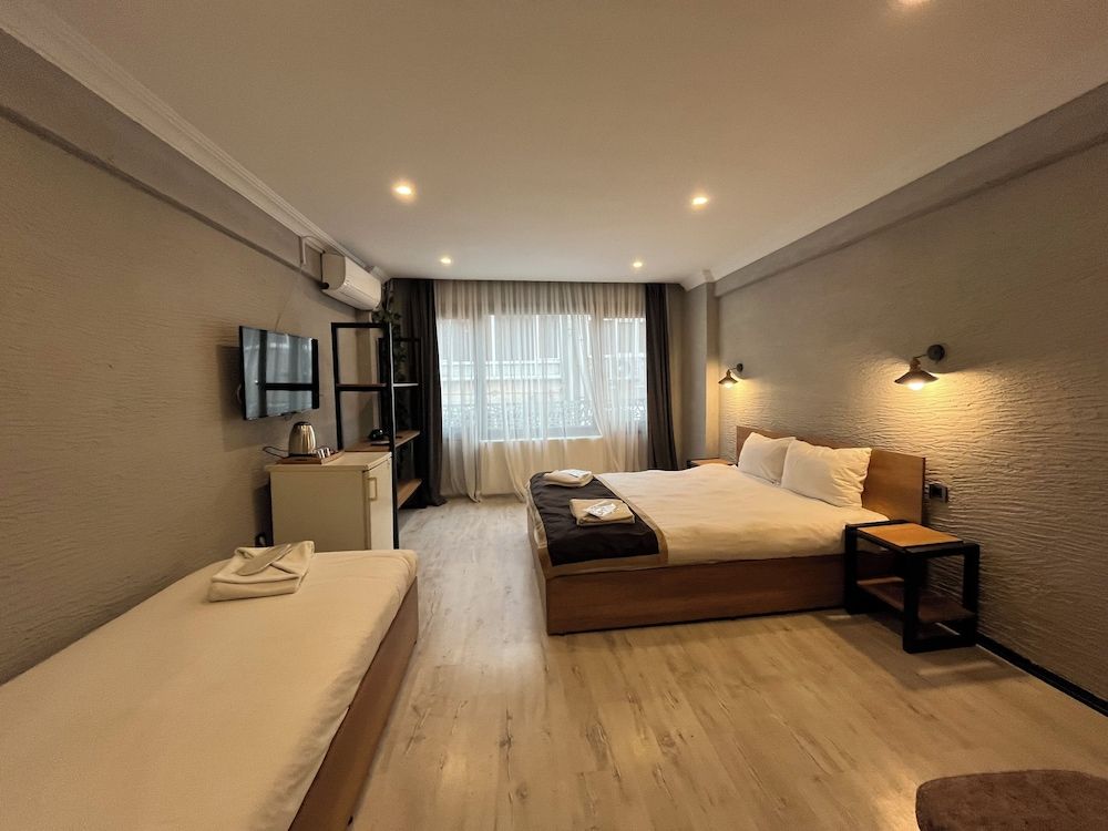 Deluxe Triple Room