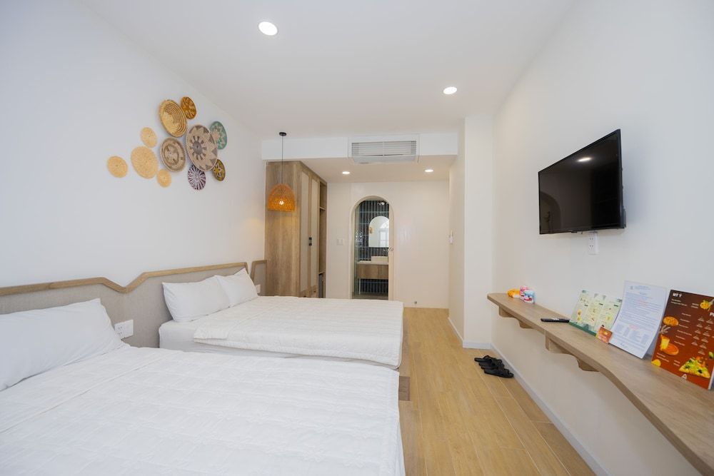 Premier Quadruple Room, Multiple Beds, Balcony, Beach View