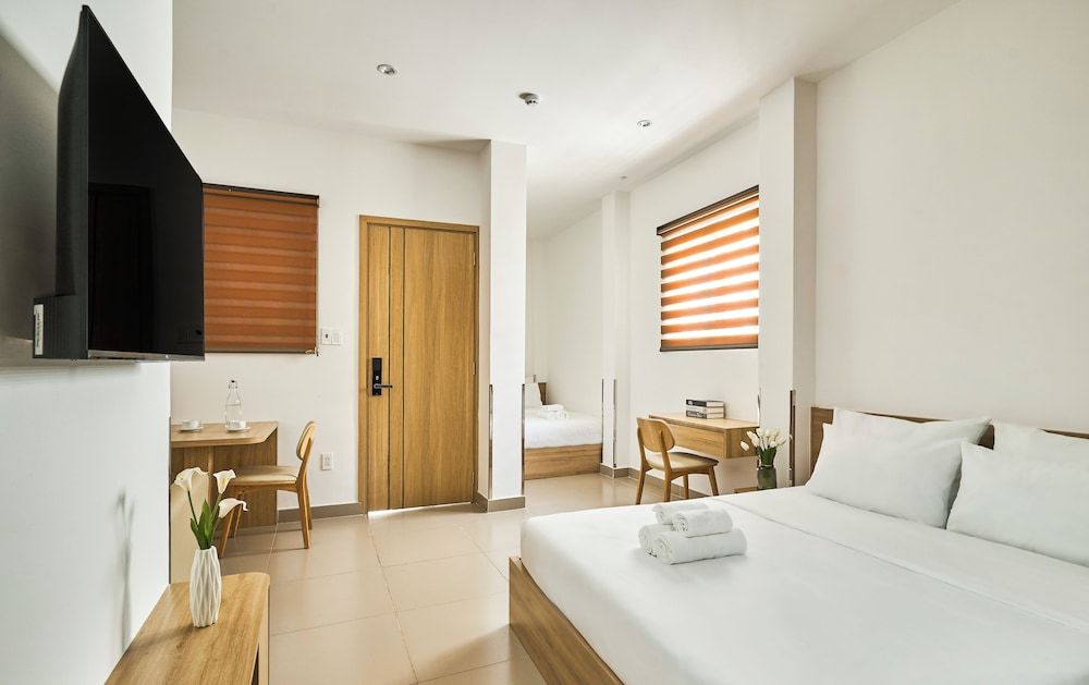 Mihn Suites Ben Thanh Executive Triple Room 2