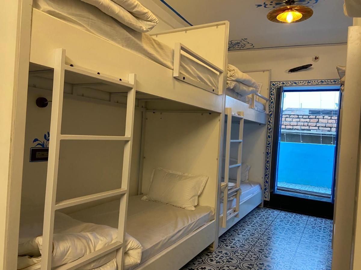 Bed in Suit Dorm With Balcony