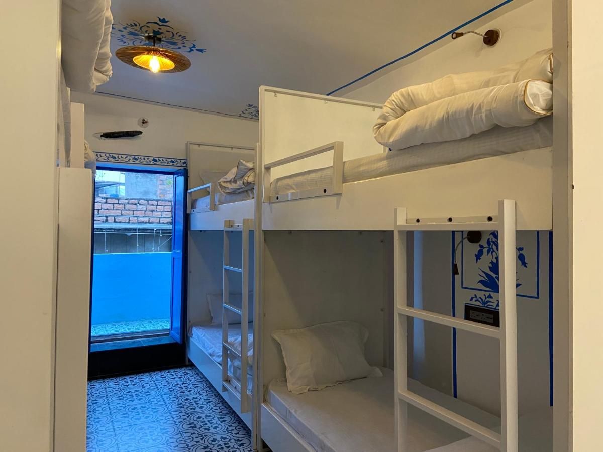 Bed in Suit Dorm With Balcony