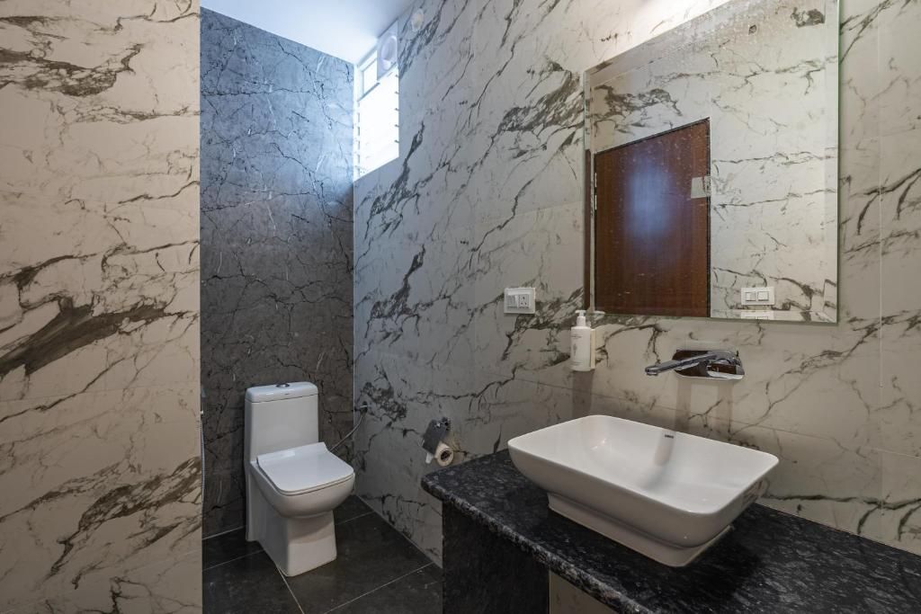 The Hosteller Goa, Mandrem Deluxe Double Room with Balcony and Sea View 5