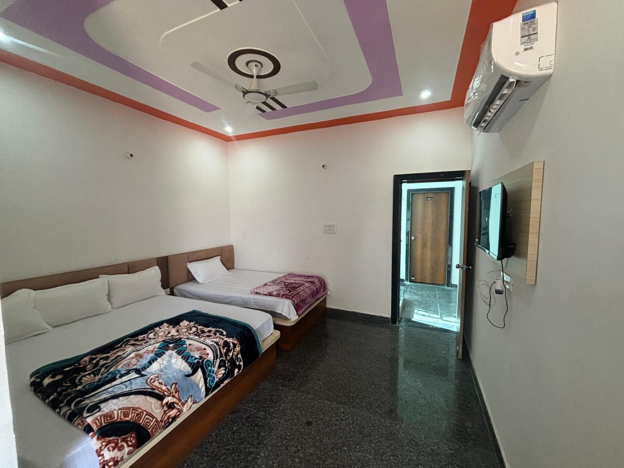 Triple Bed Room With Air Conditioning