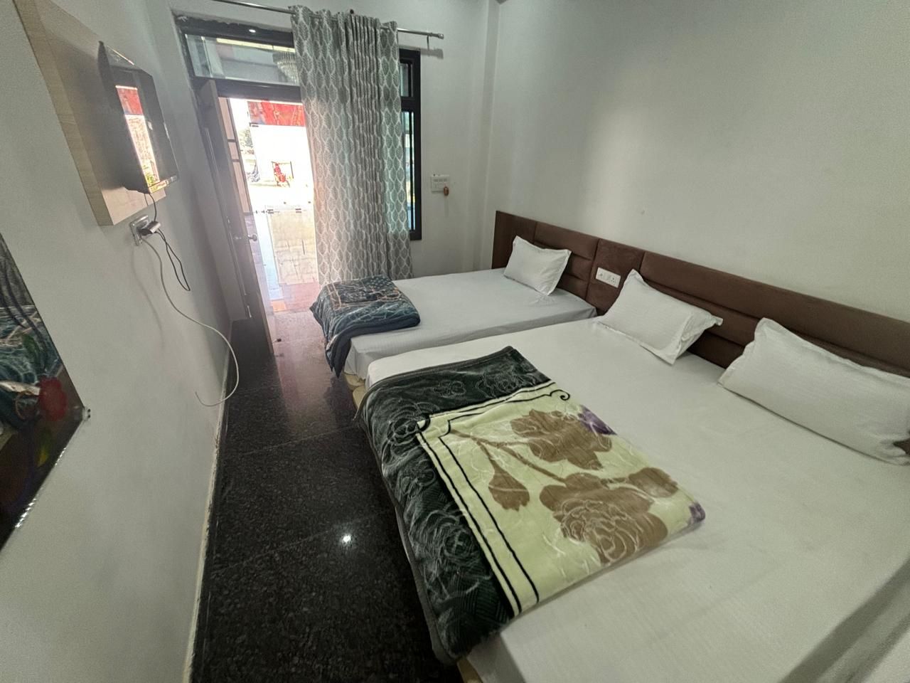 Triple Bed Room With Air Conditioning