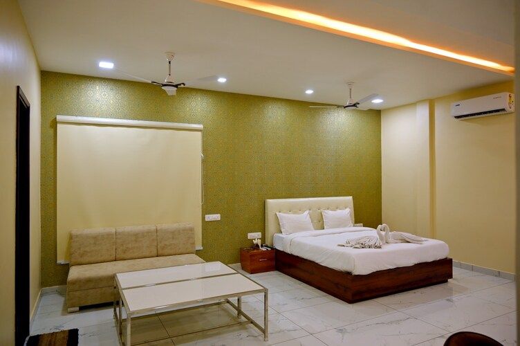 Deluxe Room (Free Pickup and Drop from Railway Station or Bus Stand)