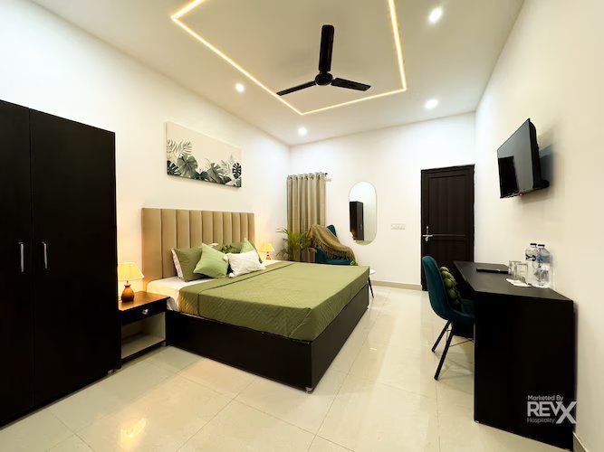 Wanna Stay Ayodhya Deluxe Room 4