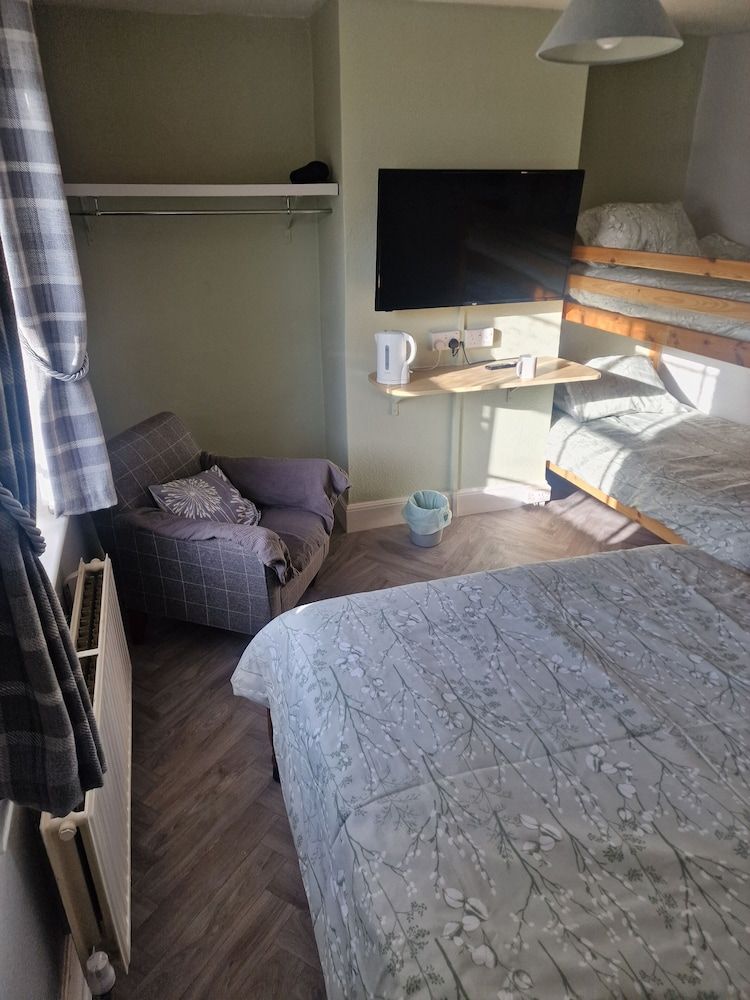 The Village Inn Standard Quadruple Room