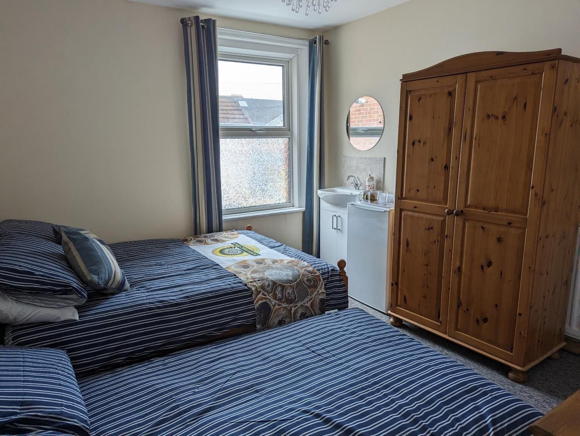 Economy Quadruple Room with Shared Bathroom