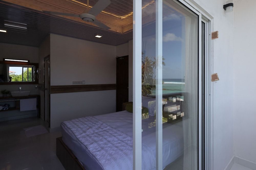 Batuta Maldives Fourson Deluxe Double or Twin Room 6