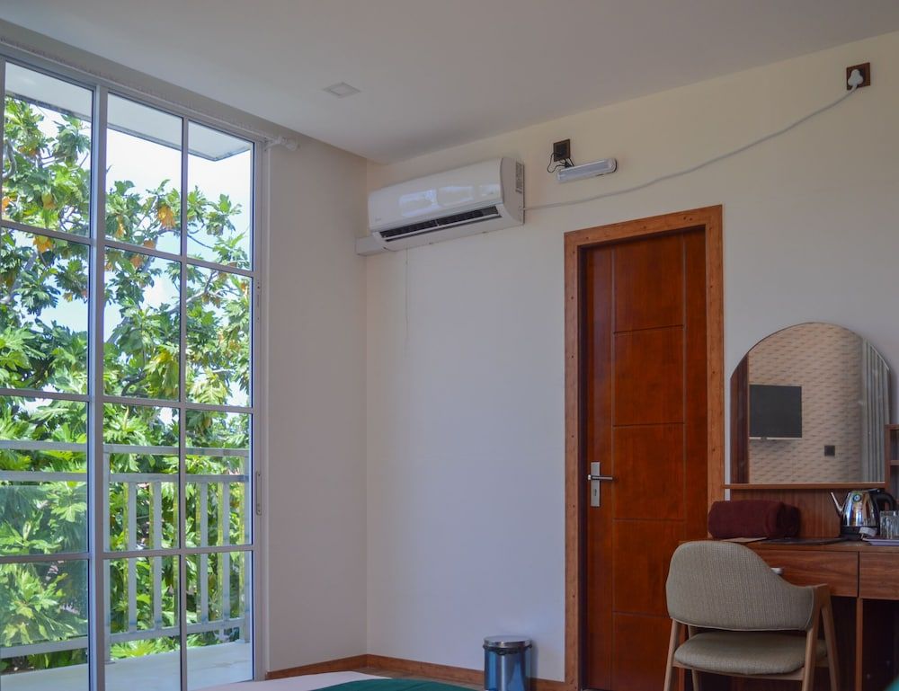 Maaniya Palace Family Quadruple Room 8