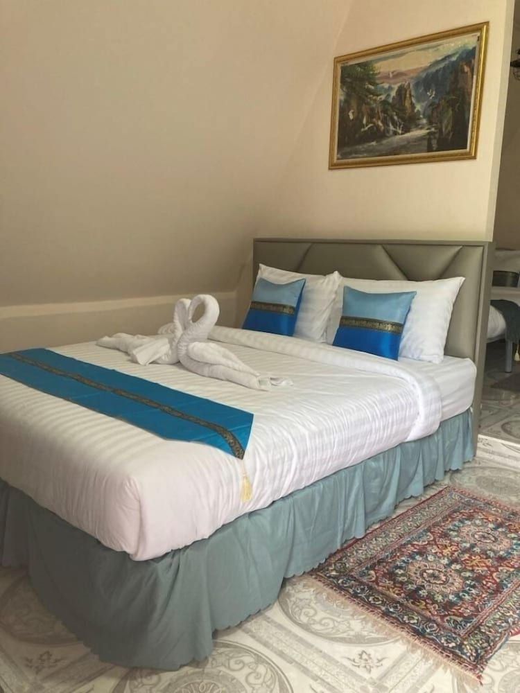 View Thara Resort Deluxe Quadruple Room, Garden View