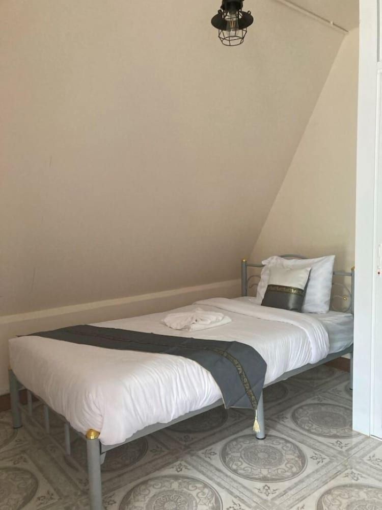 View Thara Resort Deluxe Quadruple Room, Garden View 3