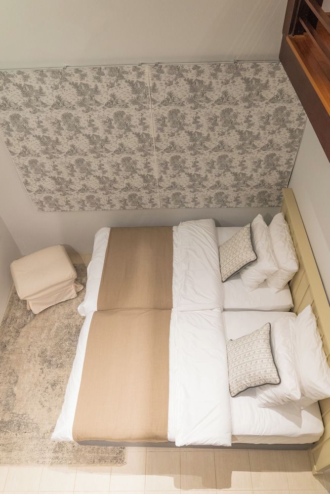Family Triple Room, Balcony, Garden View