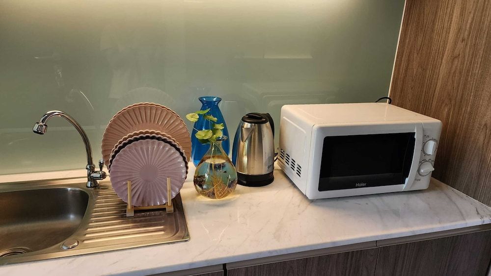 Alaita Boutique Phuket Deluxe Triple Room, Balcony 9