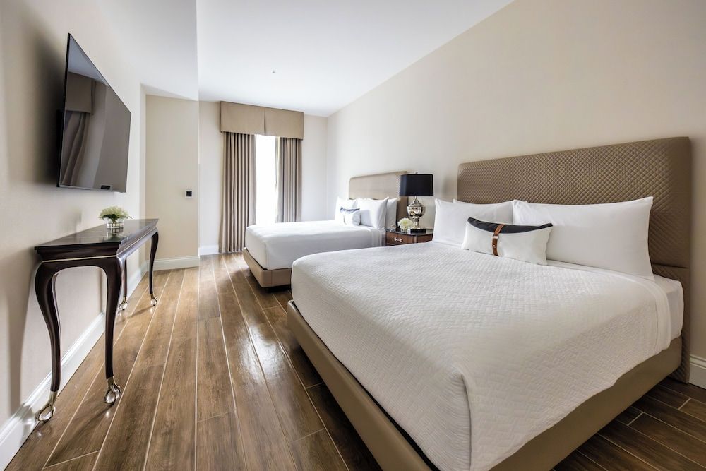 The Riding Academy Hotel Double Queen Suite with Balcony