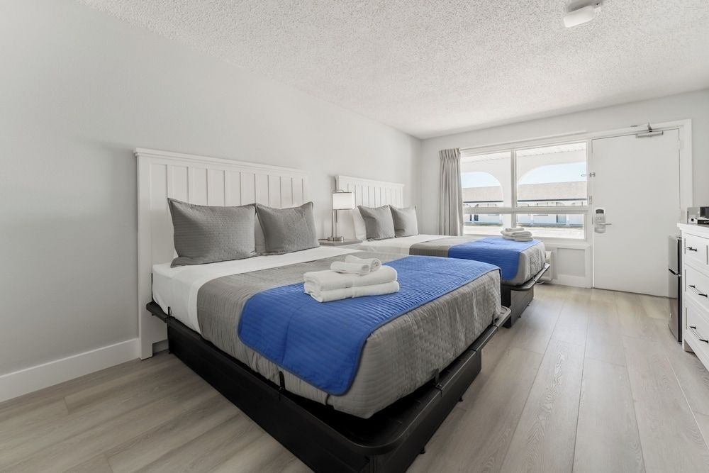 Mia's Boutique Hotel COURTYARD room, 2 Queen Beds, Across the street from the Beach