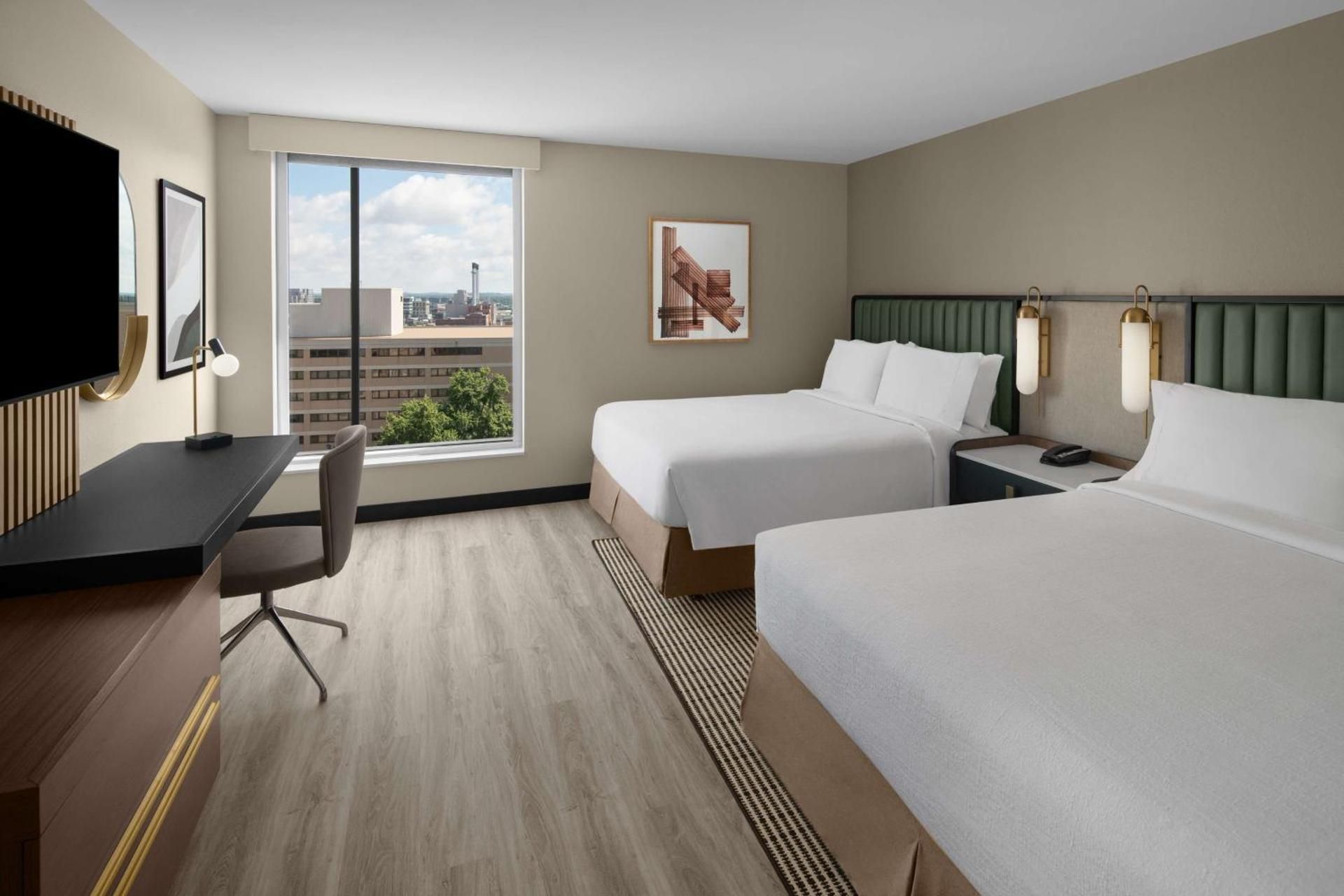 2 QUEEN BEDS 1 BEDROOM SUITE WITH SOFABED