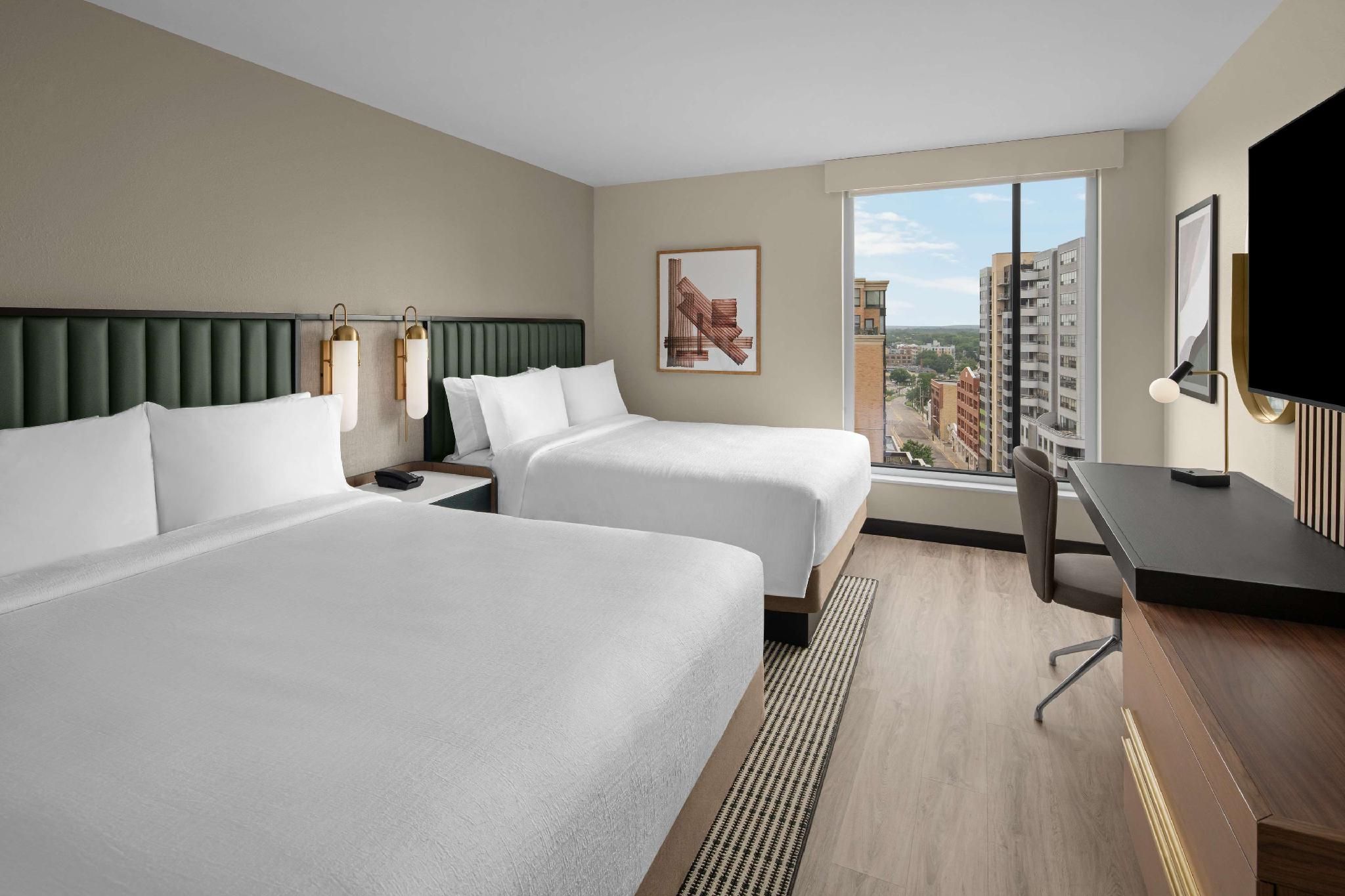 2 QUEEN BEDS 1 BEDROOM SUITE WITH SOFABED