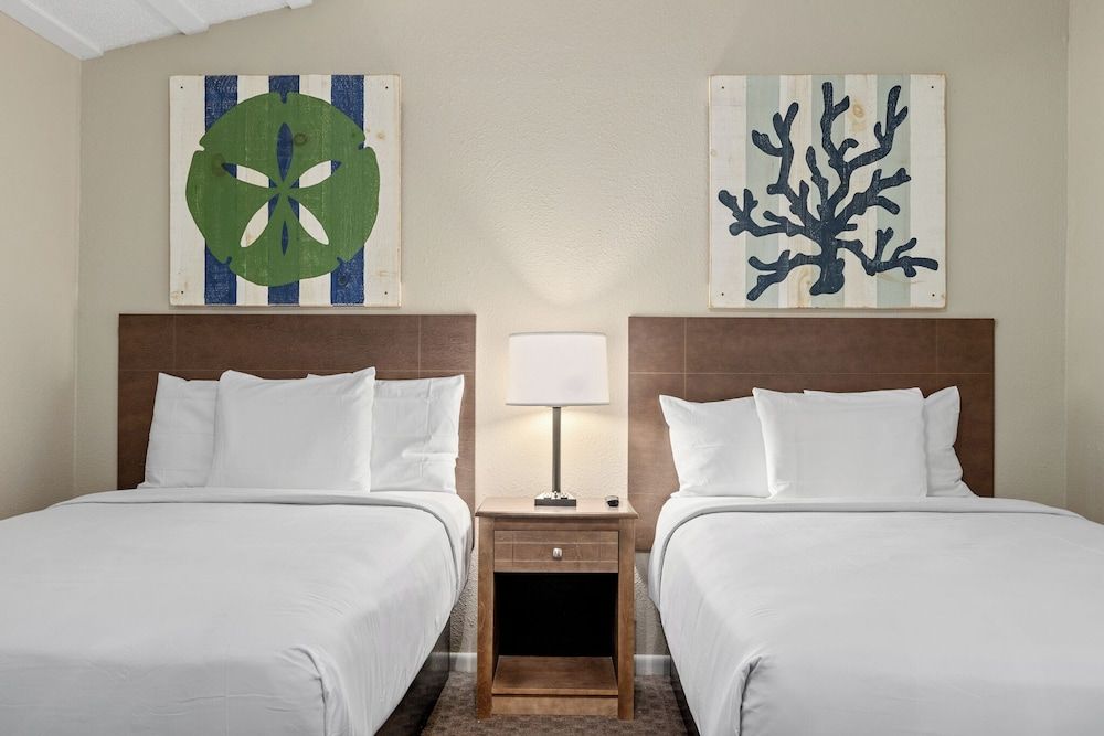 Sandpiper Beacon Beach Resort 1 Bedroom Suite Three Double Beds w/ Sofa Sleeper Beach Front Groundfloor
