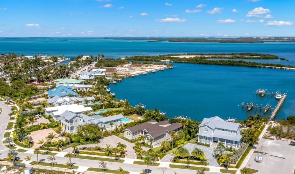 Aquaria House by Brightwild Pool Boat Dock House 13