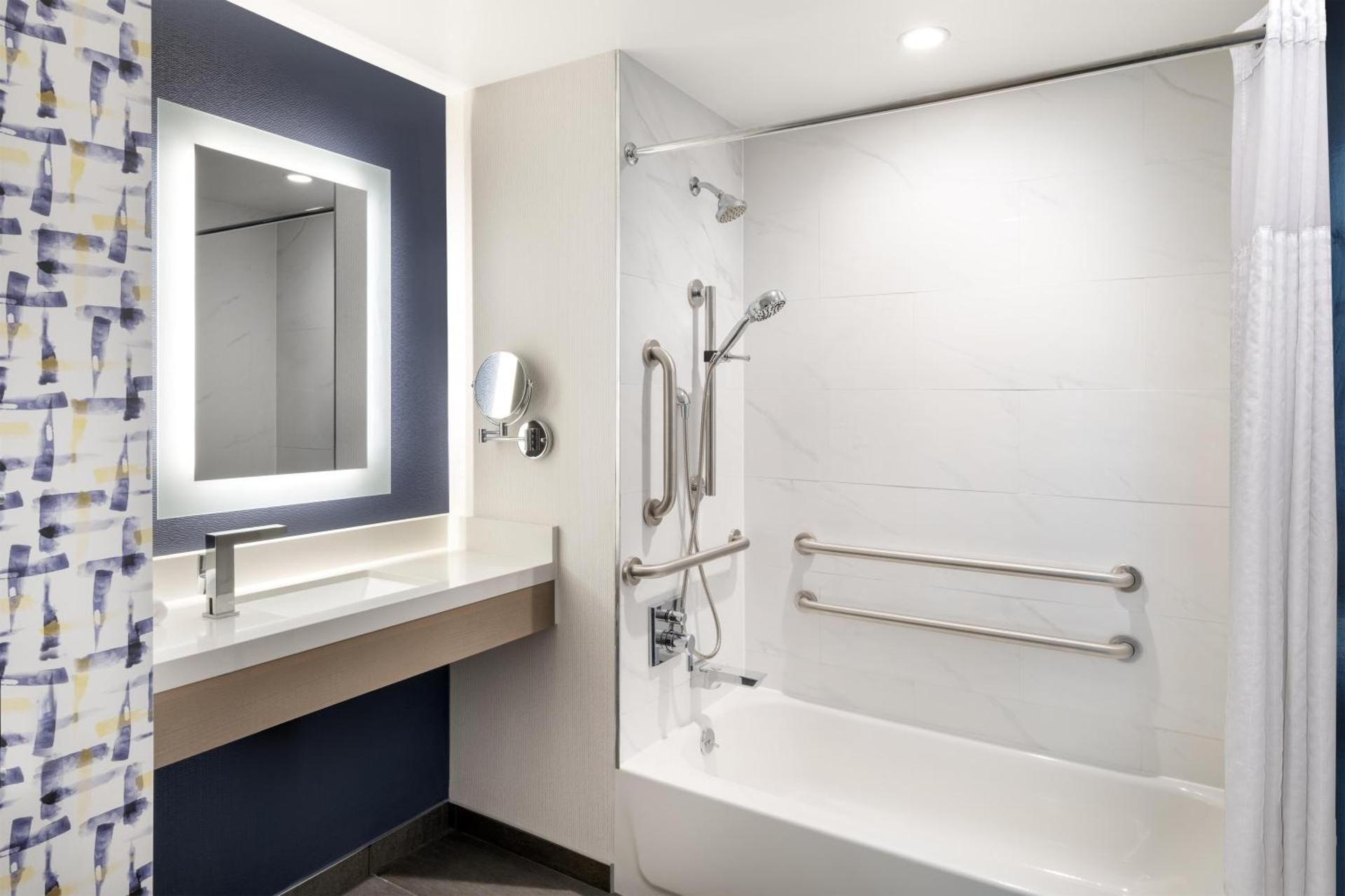 1 Queen Mobility Accessible Roll in Shower