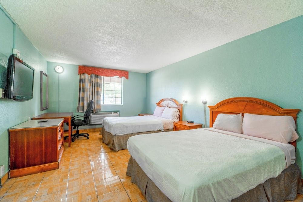 Lone Star Inn & Suites Room, 2 Double Beds, Smoking 4