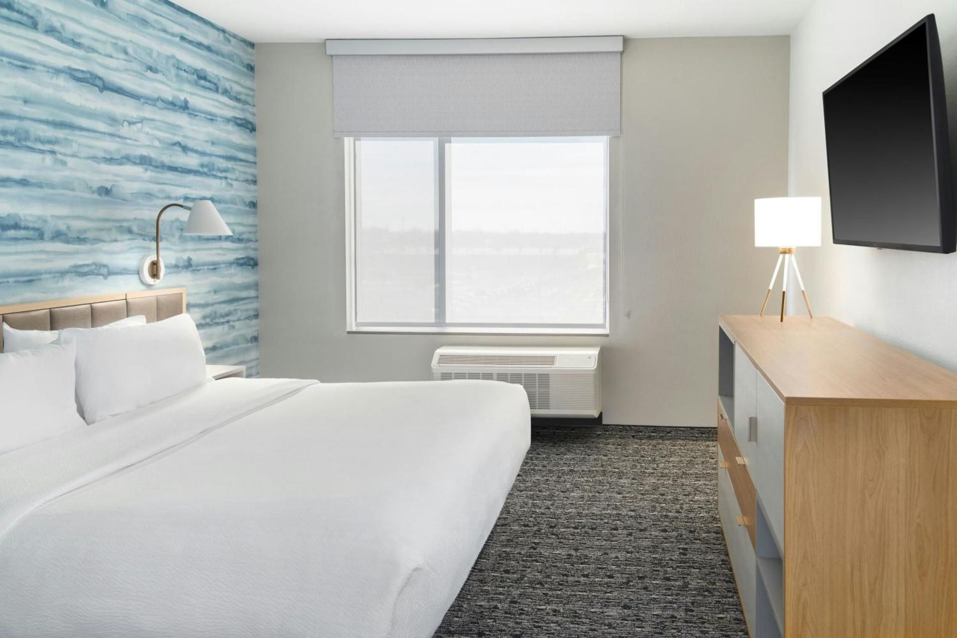 One-Bedroom King Suite with Sofa Bed and City View