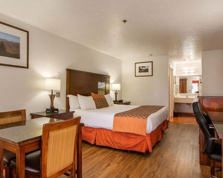 Suite with One King Bed, One Queen Bed and Tub with Grab Bars - Mobility Accessible/Non-Smoking