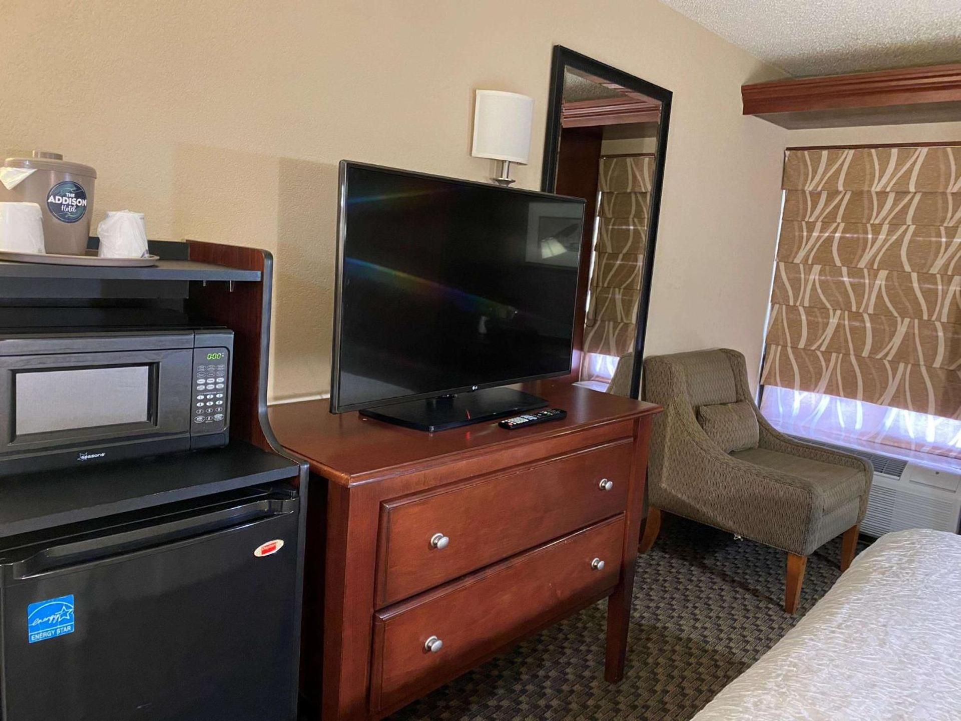 The Addison Hotel, SureStay Collection by Best Western 1 King Bed, Non-Smoking, Walk In Shower, Microwave And Refrigerator, Continental Breakfast
