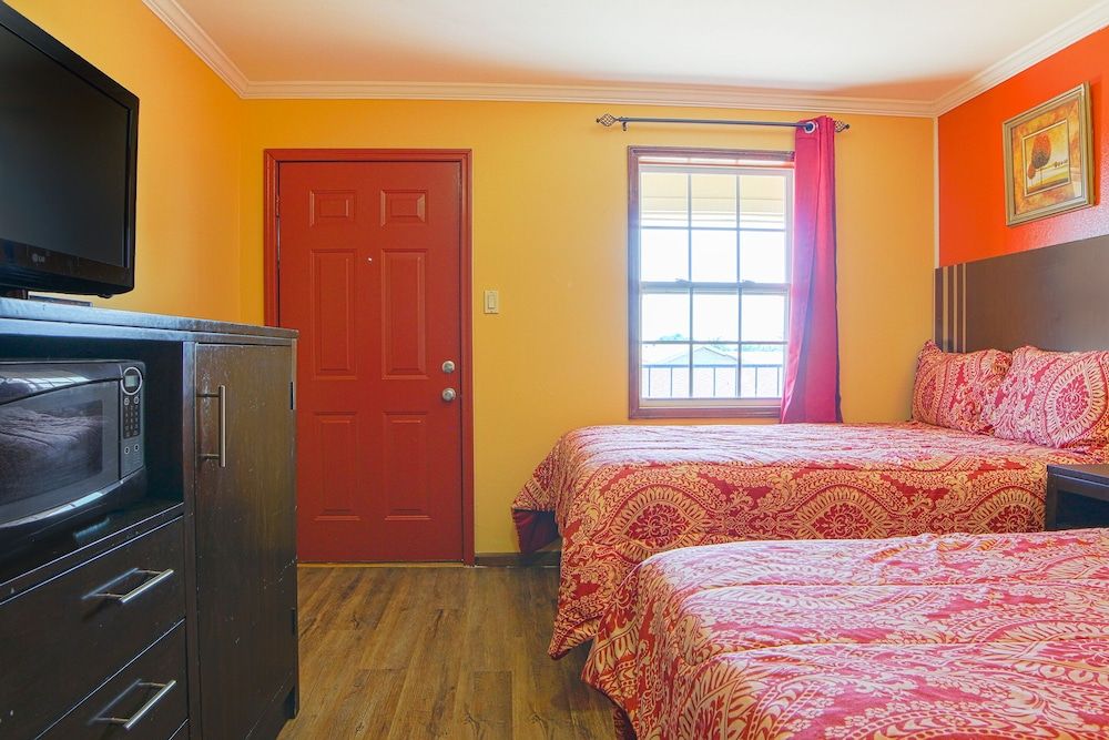 Economy Inn By OYO Lockport near Houma Room, Multiple Beds